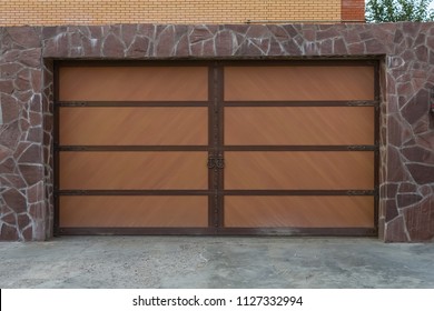 Swing Gates With Wood Texture In The Garage