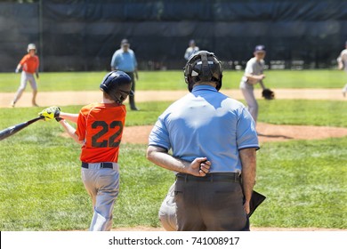 Swing And Miss At Youth Baseball Game