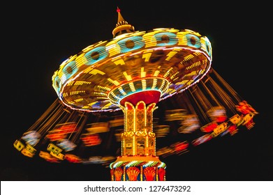 Swing Ride at night - Powered by Shutterstock