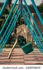 Swing Set In Childrens Playground