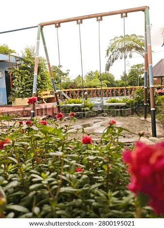 A Swing Set in the Garden