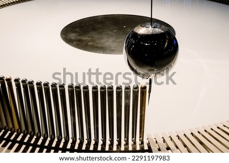 Swinging ball of the Eddy pendulum in a science demonstration.