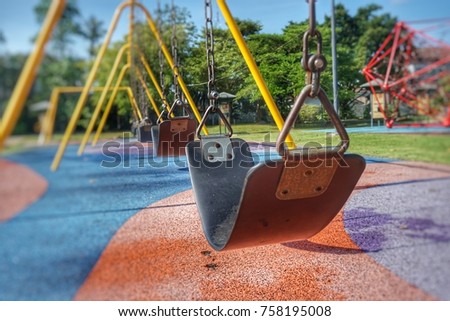 Swings for children in the park.