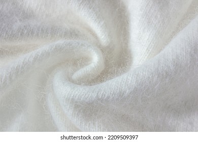 Swirl Of White Alpaca Fabric And Mohair Wool Sweater Texture