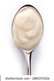 Swirled Yogurt In Spoon. Top View