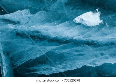 Swirling Ice Texture Under Frozen Surface Of Baikal Lake Near Shaman Rock At Olkhon Island,Siberia,Russia.Using To Show Rapid Transformation Of Water.