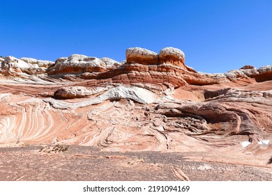 Swirling, Multicolored Formations Of Navajo Sandstone At White Pockets