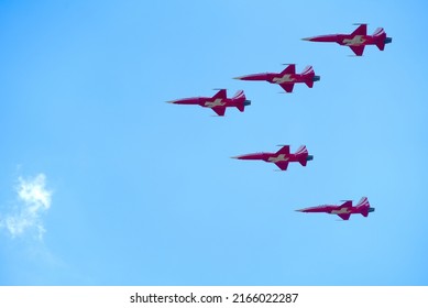 Swiss Air Force display team Patrouille Suisse exercising for start of bicycle stage race Tour de Suisse at village Forch on a sunny summer noon. Photo taken June 10th, 2022, Zurich, Switzerland.