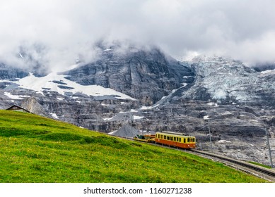 Swiss Alpine Train Heading Into Station After Approaching Bad Weather