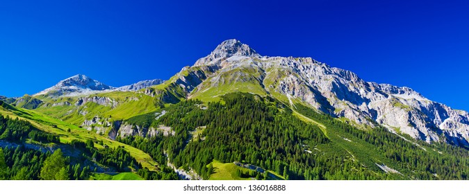 Swiss Alps Mountains Summer Panorama.