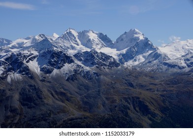 Swiss Alps: Snowmountain-Panorama from Julier in the upper Engadin. Due to the global clima change the perafrost of the swiss alps is melting and causing a threat to the villages and people