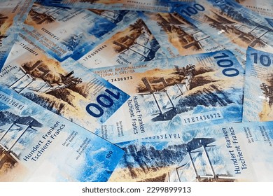 Swiss banknotes background. Swiss francs in denomination of 100 - Shutterstock ID 2299899913
