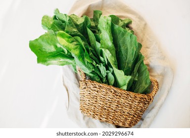 swiss chard. turkish green leaf chard Pazı. fresh swiss chard leaves in a basket on a light background. top view. greens. close-up. super food. healthy food vegetarian concept.