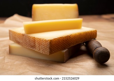 Swiss cheese collection, gruyere cheese made from unpasteurized cow's milk close up - Shutterstock ID 2152526029