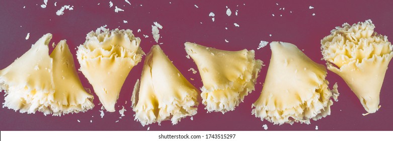 Swiss Cheese Tete De Moine Or Monastery Monk's Head, Scraped With A Girolle Special Knife, Rosettes On A Dark Slate Background, Copy Space, Selective Focus