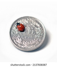 Swiss Franc Coin With Lady Bug Close Up