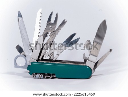 Swiss knife multi purpose tool utility equipment on white background 