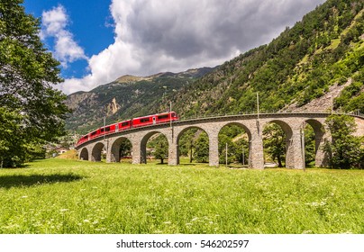 Swiss Mountain Train Bernina Express On The Viaduct, Switzerland