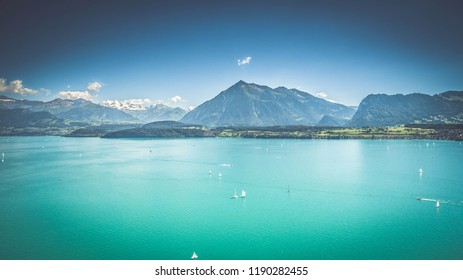 Swiss mountains, lake, sky landscape