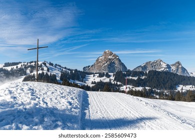 The Swiss sports resort over the Ibergeregg Pass with Alps summit Grosser and Kleiner Mythen