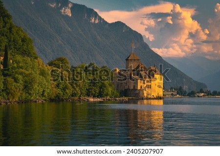 Swiss touristic and travel destination, Chillon castle on the shore of the lake Geneva at sunset, Montreux, Switzerland, Europe