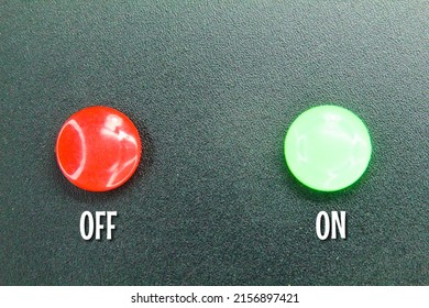 the switch buttons are red and green. switch the green button on and the red button off - Shutterstock ID 2156897421
