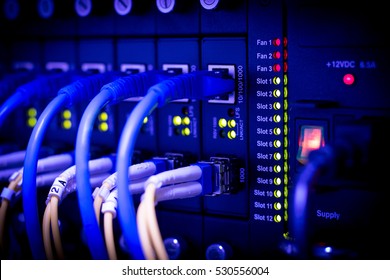 the switch led and Networking Server telecom,
Is a center installed connection technology,
Network power storage room to connect data to computer firewall. - Shutterstock ID 530556004