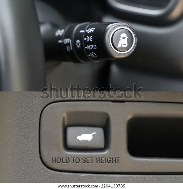Switch off lights in a car.\
close-up Car integrated turning indicator with headlight switch\
toggle.