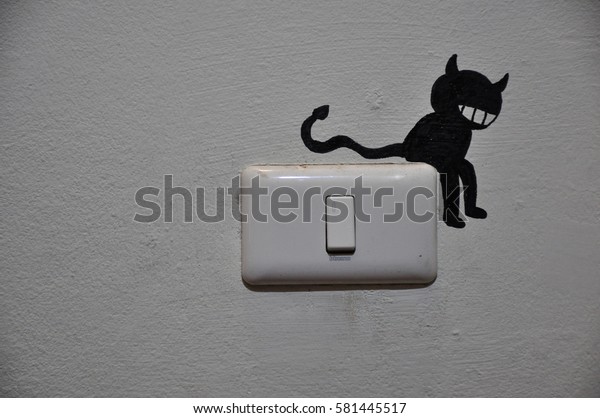 Switch Painting Devil On Wall Stock Photo Edit Now 581445517