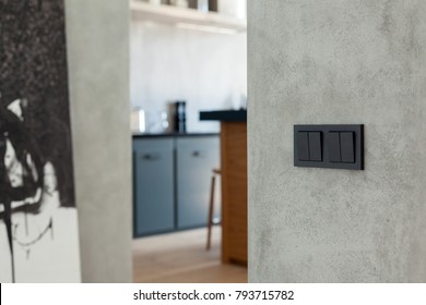 Switch and socket in the kitchen background