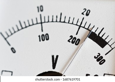 Switch voltmeter close-up. Voltage is 220 volts. Dial of an analog voltmeter - Shutterstock ID 1687619701