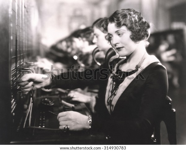 Switchboard operators at\
work