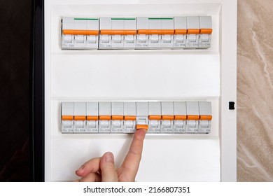 Switching On Circuit Breaker On Panel Board It Has Tripped Due To Overcurrent.