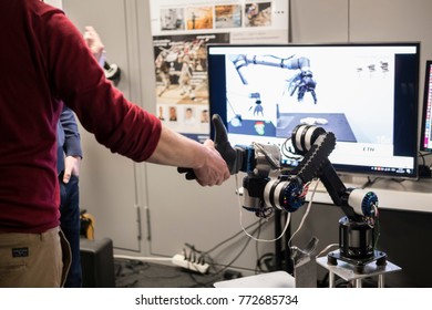 Zürich / Switzerland - 12.09.2017: Handshake Between A Man And A Robot At The Open Lab Day At ETH University