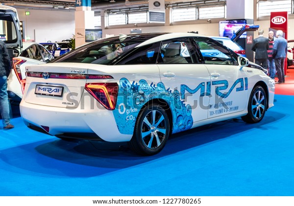 Zürich,\
Switzerland 8th November 2018\
Rear side view of a white Toyota\
Mirai fuel cell car at AutoZürich 2018 car\
show.