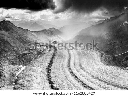 Similar – Serpentinen der alten Straße über den Gotthardpass in den Schweizer Alpen