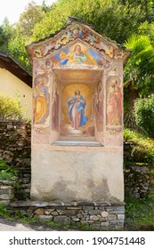 Switzerland, Aurigeno, Sept 2020. Historic Holy Shrine With Colorful Madonna Painting