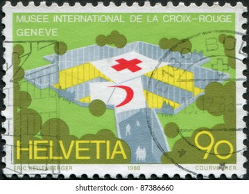 SWITZERLAND - CIRCA 1988: A Stamp Printed In Switzerland, Is Depicted Museum International Red Cross And Red Crescent Movement, Geneva, Circa 1988