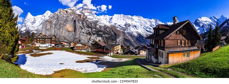 Switzerland nature and travel. Alpine scenery. Scenic traditional mountain village Murren surrounded by snow peaks of Alps. Popular tourist destination and ski resort - Shutterstock ID 2199047833