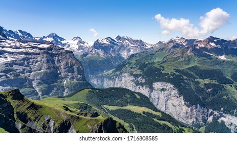 Switzerland, Panoramic View On Murren And Green Alps Around