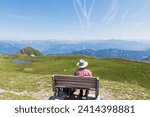 Switzerland- st gallen canton- man resting on bench- looking on the mountains