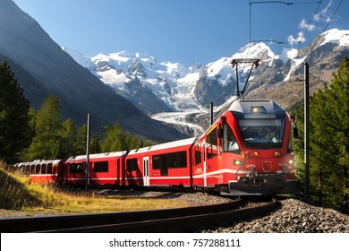 switzerland  train in front of glacier Morteratsch Bernina