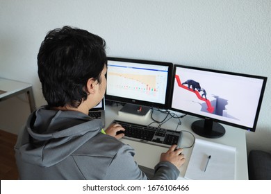 Zürich, Switzerland-03-17-2020: A Stock Broker In Home Office 