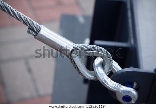 Swivel joint and connection\
with a steel cable when installing the structures outdoor\
close-up