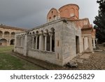 SW-NW corner, porticos and exonarthex of the church -katholikon- of the Saint Mary Monastery with a colonnade crowned by capitals of Romanesque decoration -sirens-animals-monsters-. Apollonia-Albania.