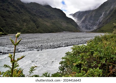 Swollen River At The Glacial Valley Near Franz Josef Glacier In Summer.