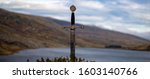 The sword excalibur is shown with lake Ogwen in the background and Tryfan to the right.