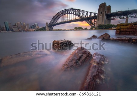 Similar – Happy woman looking at camera with Harbor Bridge in the background, in Sydney city, Australia.