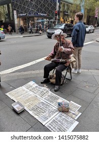 Sydney, Australia 06 01 2019: Old Asian Man Busking For Money On Shopping District Pitt St, Playing Traditional Chinese Musical Instrument Erhu