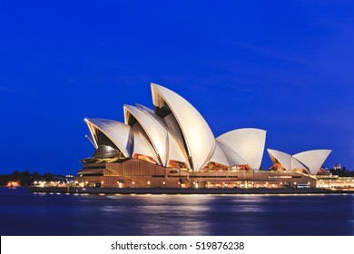 Sydney, Australia - 15 November 2016: Iconic worlds' buildings - Sydney Opera house in full glory at sunset brightly illuminated